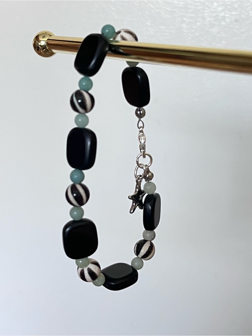 Black, White, & Blue Beaded Bracelet with Starfish Charm
